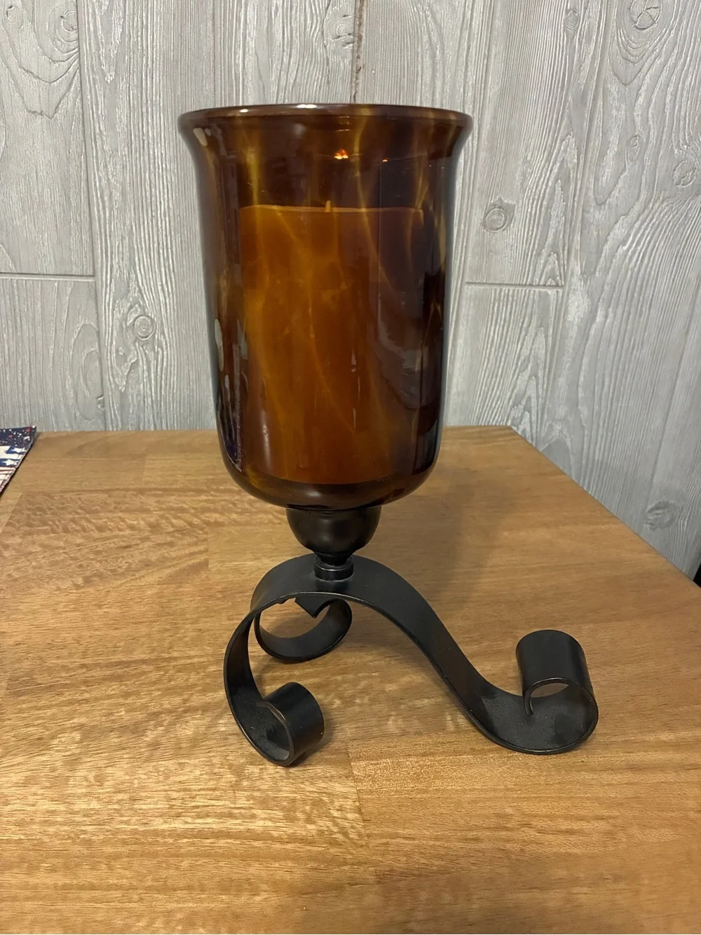 Amber Glass Hurricane Candle Holder with Black Scroll Base 11” x7”
